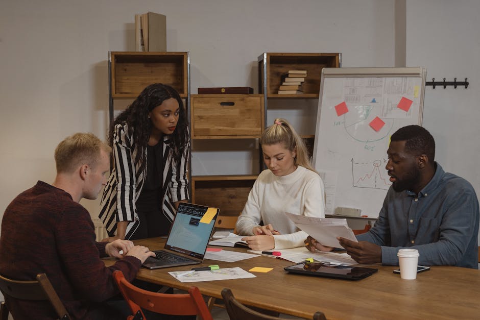 Zespół profesjonalistów podczas inspirującego spotkania biznesowego